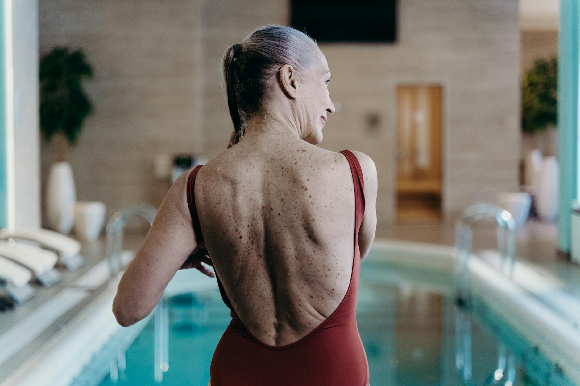 A woman relaxing poolside