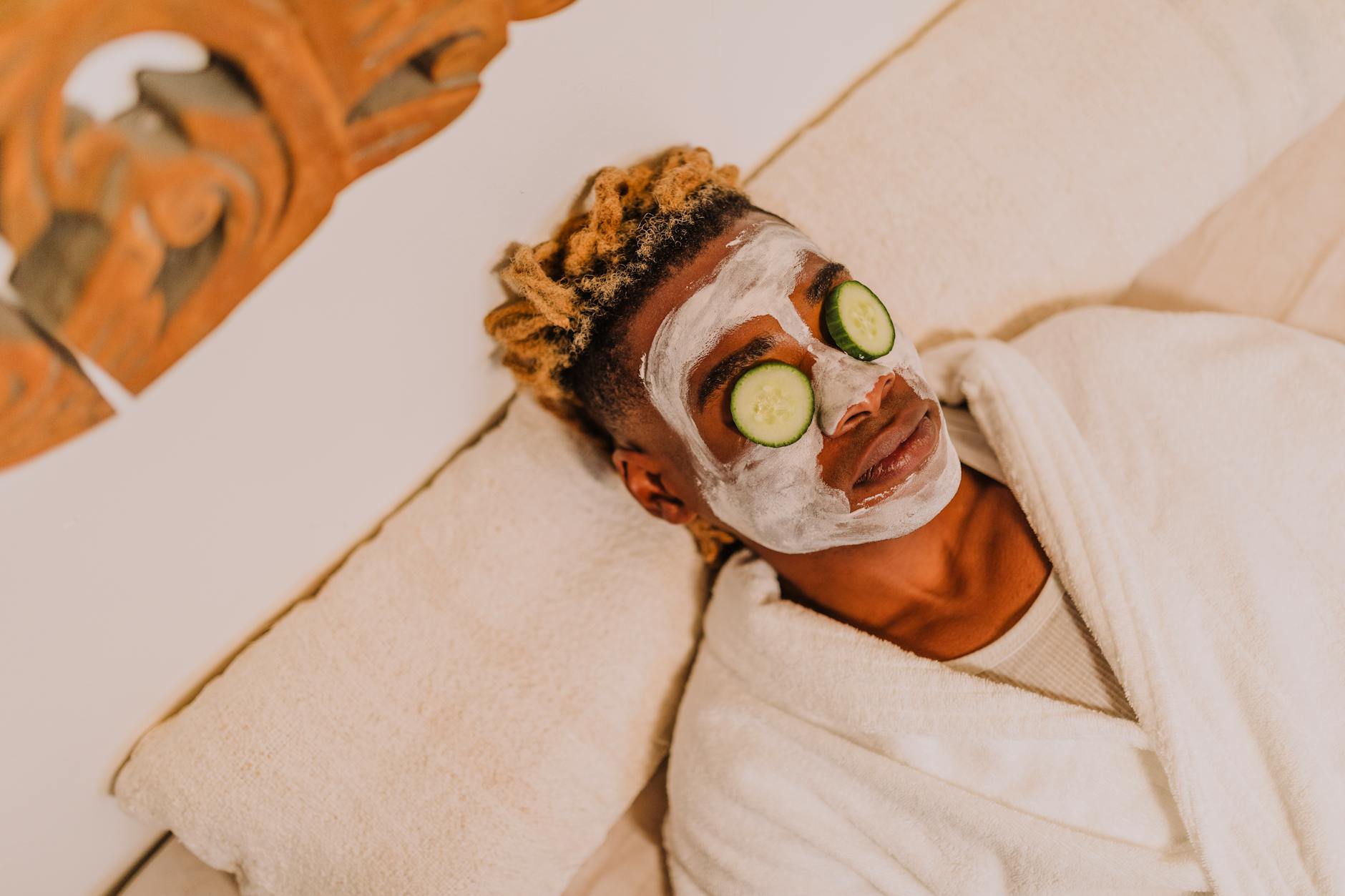 A patient relaxing during a facial treatment